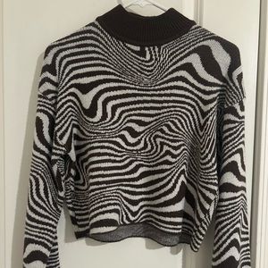 Sweater with wavy stripes